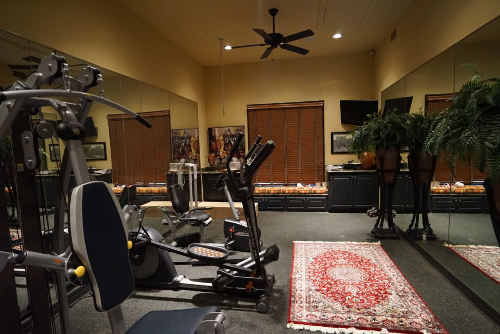View of Fully Equipped Exercise Rooms | Flint Custom Homes